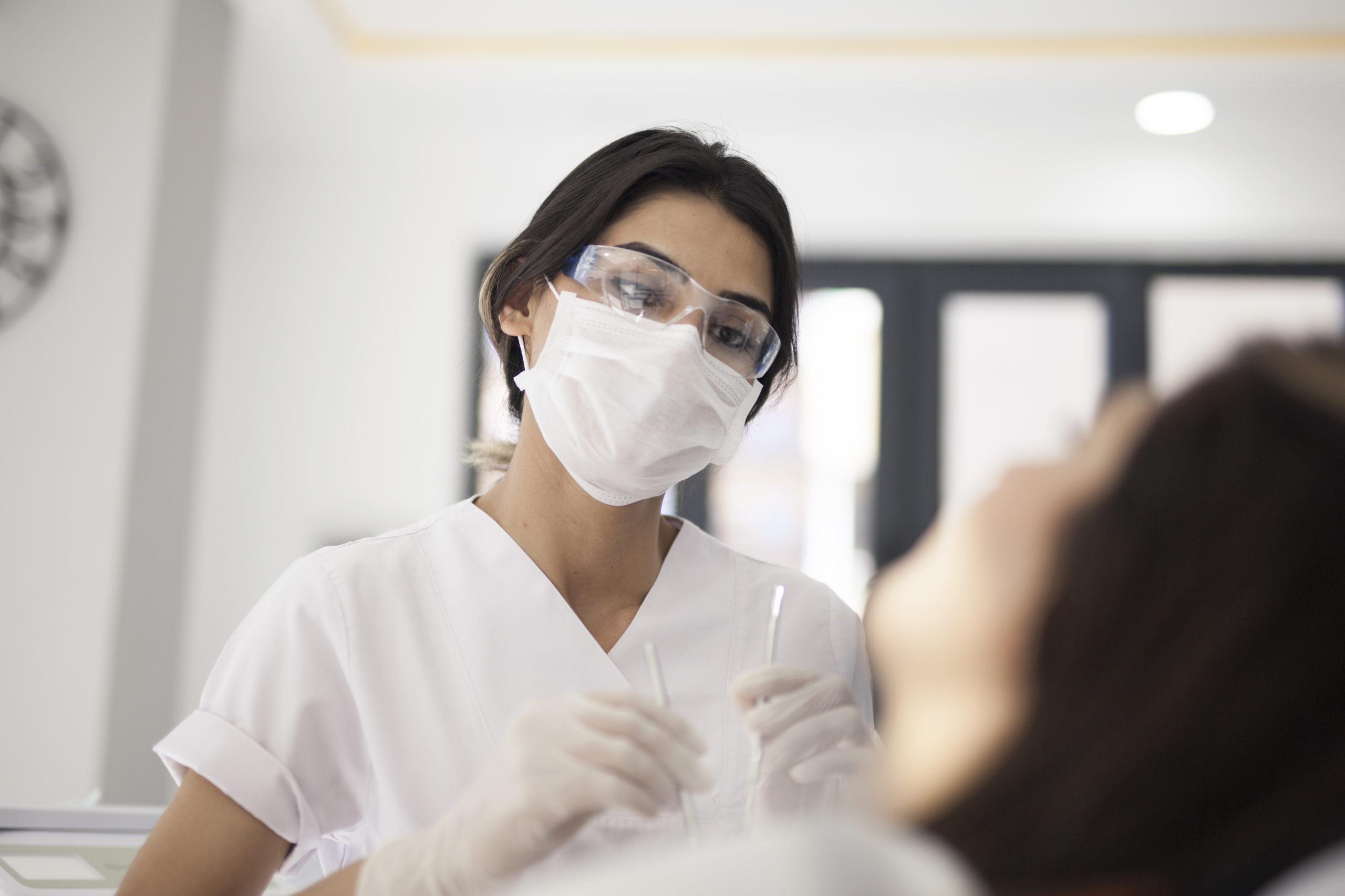 Dentist with mask.