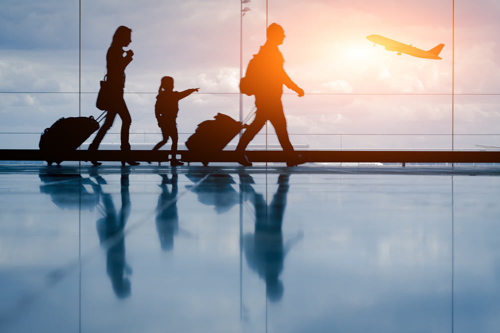 Silhouette,Of,Young,Family,And,Airplane