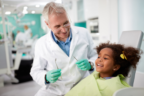 Happy,Kid,On,Dental,Chair,After,Repairing,Tooth